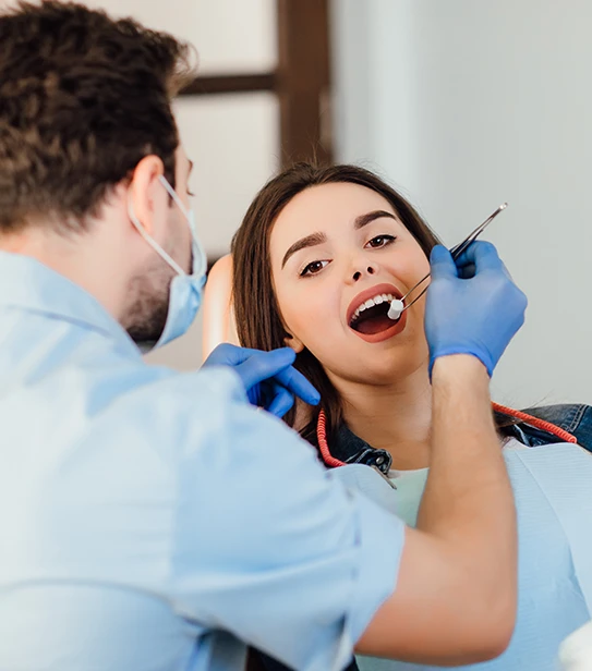 Professional dental cleaning and oral hygiene check-up at a modern dental office.